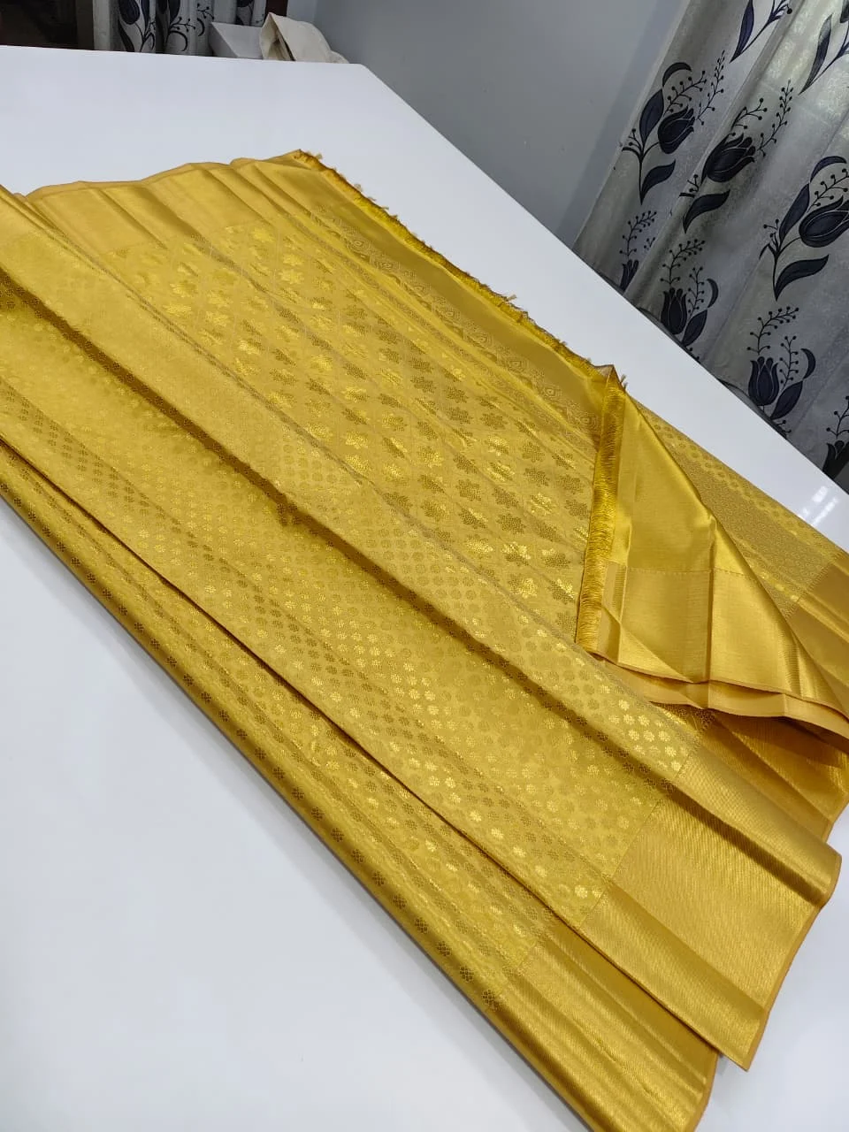 Muttu Kattam Gold Pure Kanchipuram Silk Saree.